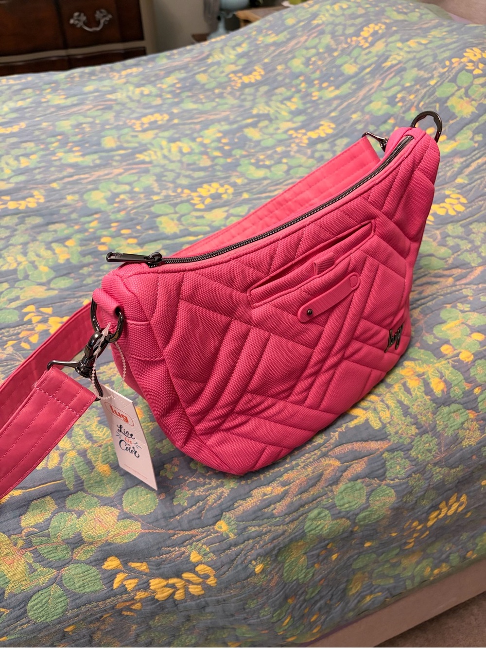 Quilted Lug Harmony Crossbody Shoulder Bag. I think the color is watermelon.